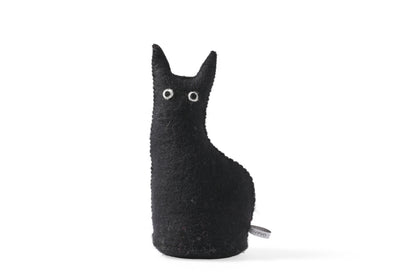 Dörrstopp - tovad svart katt